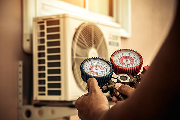 Professional Hvac technician working in College Station, TX